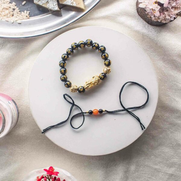feng shui pixiu black obsidian bracelet and crystal rakhi hamper for brother