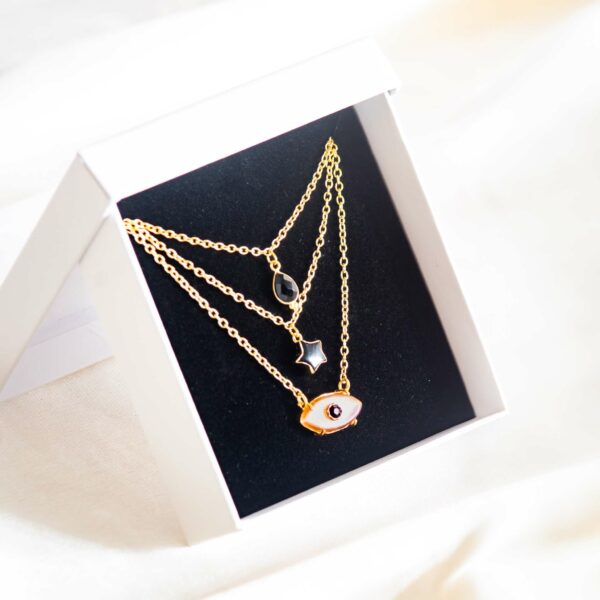 peach moonstone and black onyx necklace triple layer