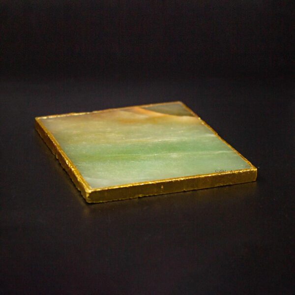 elegant jade coaster with golden borders