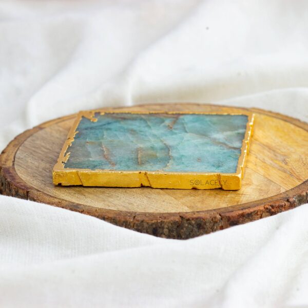 green jade coaster with gold trim