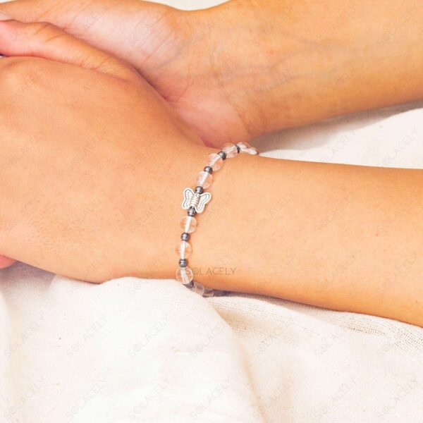 Clear Quartz Bracelet With Silver Butterfly Charm - 6mm Beads - Image 2